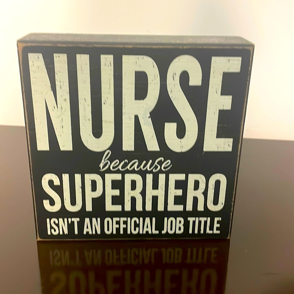 “Nurse because Superhero isn’t an official job title” Wall Decor